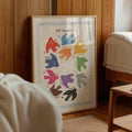 Color learning nursery canvas showing red blue orange and yellow birds