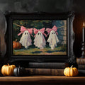 Vintage-style pink ghost canvas poster in an ornate black frame on a shelf