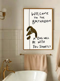Brown framed dog bathroom wall art displayed above a bathtub