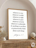 Natural wood framed Philippians 4:8 print styled on a mantel