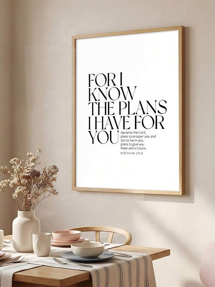 Framed Jeremiah scripture wall art above a neutral dining table