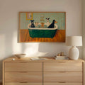 Dog bathtub print above a wood dresser with a lamp