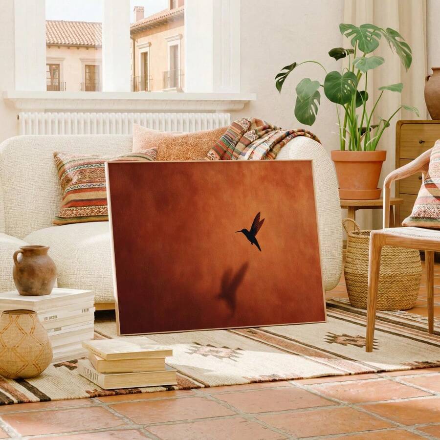 Minimal black bird silhouette artwork with earthy Southwestern colors