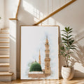 Framed watercolor mosque artwork displayed near a staircase