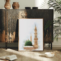 Green dome Islamic architecture poster displayed in a softly styled living room