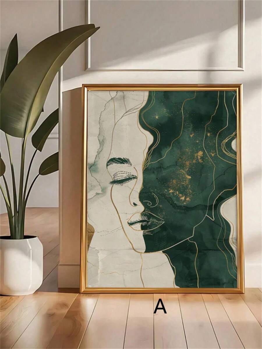 Abstract face canvas in a light wood frame beside neutral decor