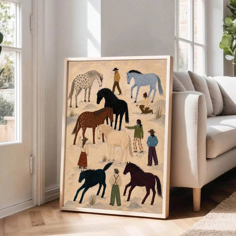 Framed equestrian wall art leaning beside a neutral living room sofa