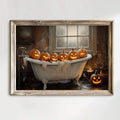 Front view of framed pumpkin bathtub artwork with six glowing jack-o'-lanterns and candlelight