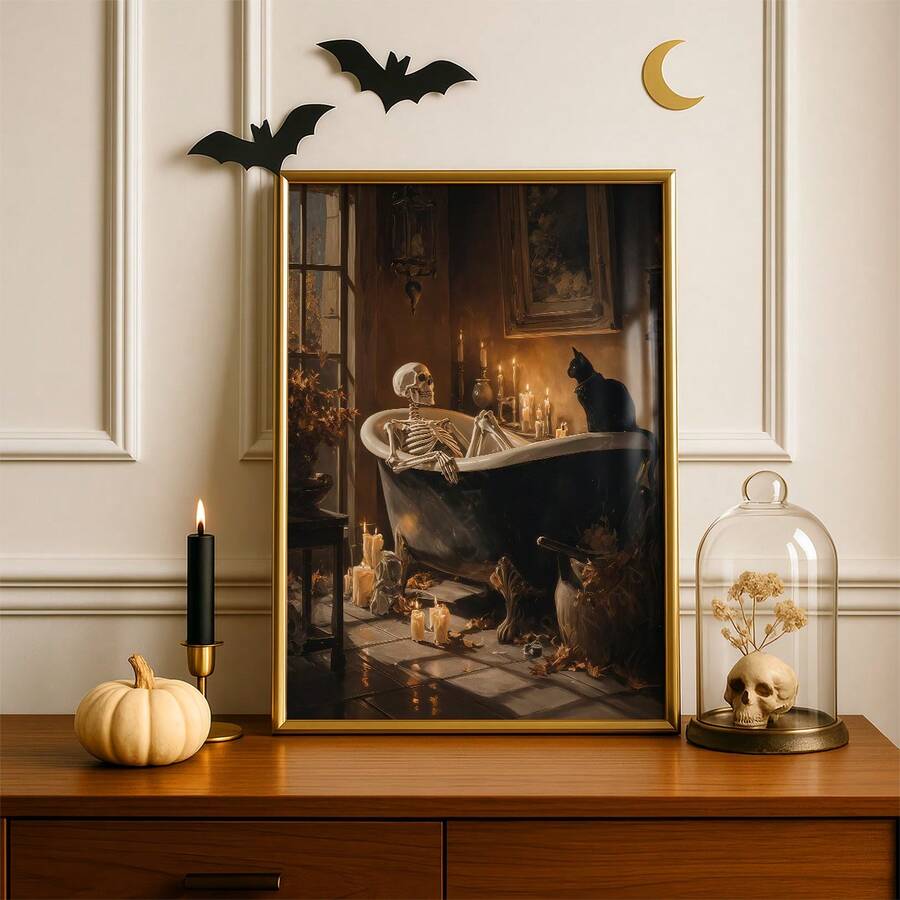 Skeleton bathtub Halloween wall art displayed on a wooden sideboard with bat silhouettes, a pumpkin and a skull under glass