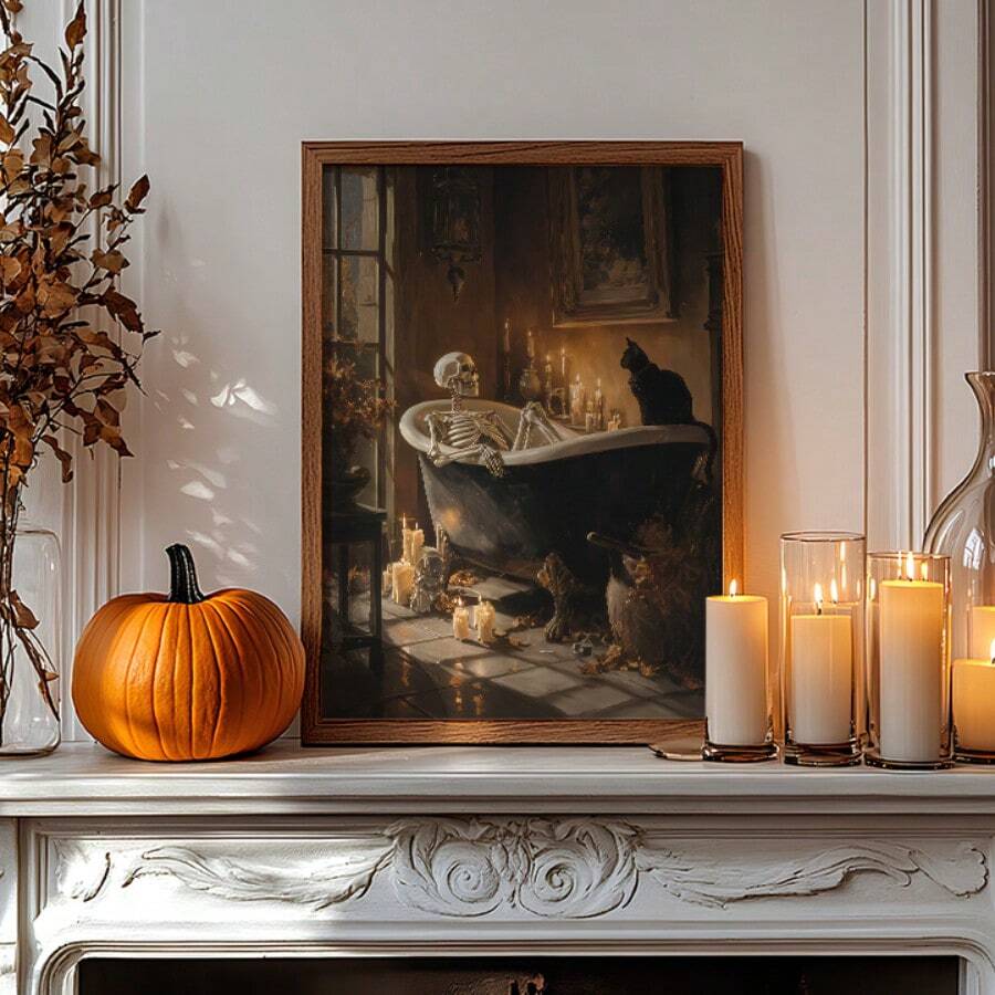 Wood-toned framed skeleton bathtub artwork on a fireplace mantel with an orange pumpkin and lit candles