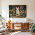Whimsical floral ghost artwork styled above a light wood sideboard