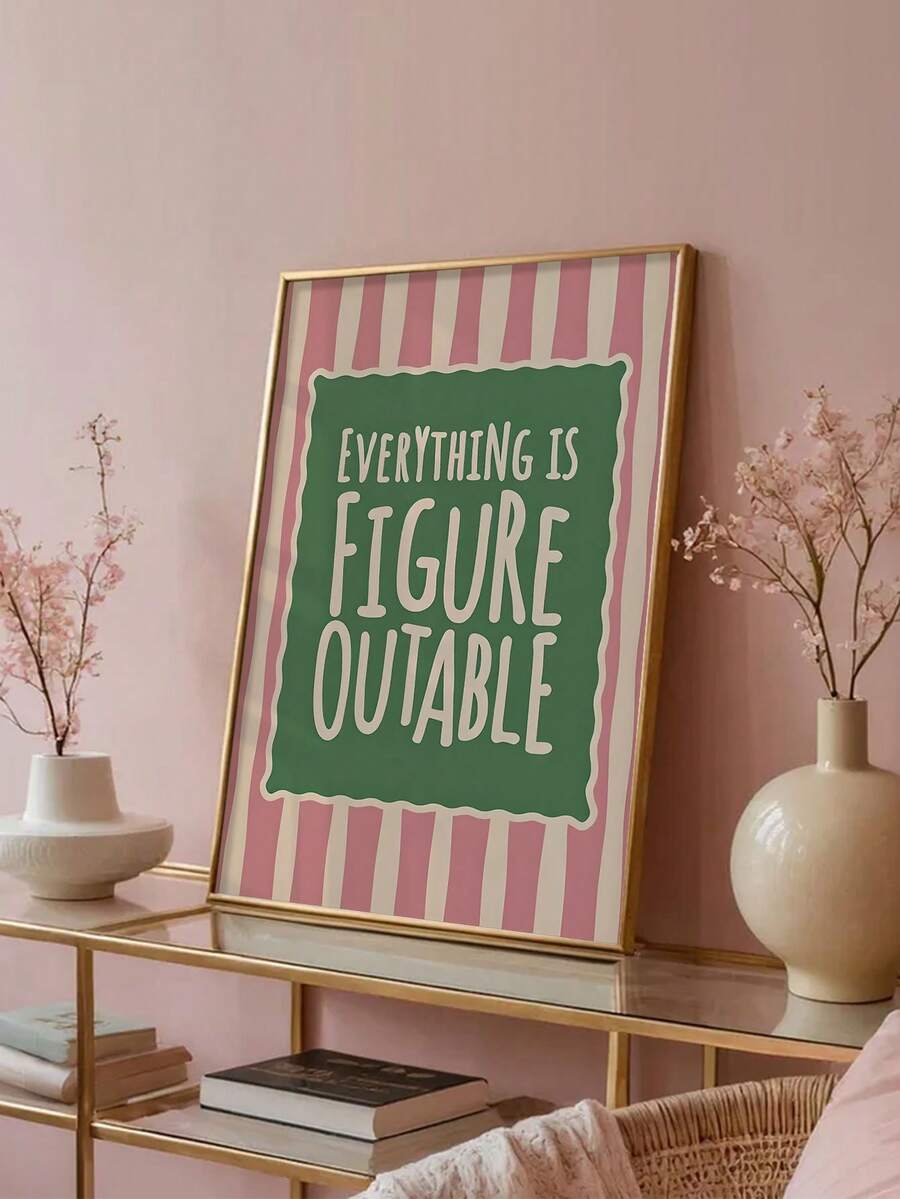 Framed affirmation print with pink stripes and green lettering on a pink wall