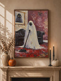 Close-up of framed ghost vacuum Halloween oil painting style wall art above a fireplace mantel