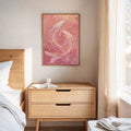 Framed koi wall art hanging above a light wood bedroom dresser