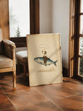 Light wood-framed surreal cowboy fish print in a rustic window nook