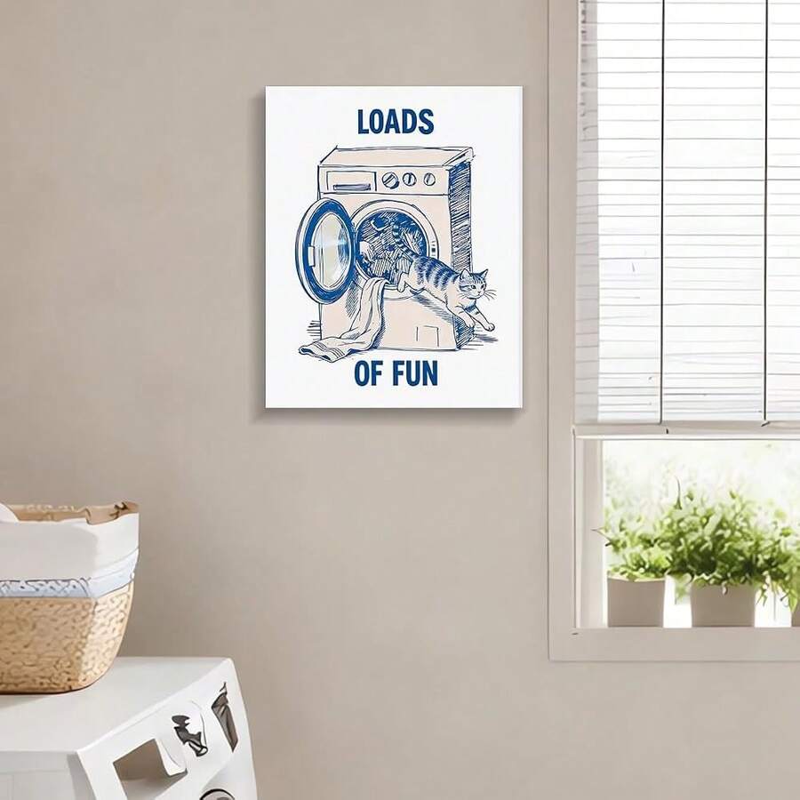Funny washing machine cat illustration hung beside a sunny laundry-room window