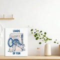 Blue cat laundry poster displayed on a bright shelf with a leafy plant