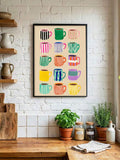 Retro coffee cup poster in a light wood frame beside a coffee machine