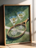 Tennis racket, martini glasses, and olives wall art in green and teal tones