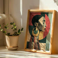 Framed portrait canvas leaning on a sunlit table near an indoor plant