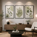 Minimalist sage and cream eucalyptus wall art above a modern sofa