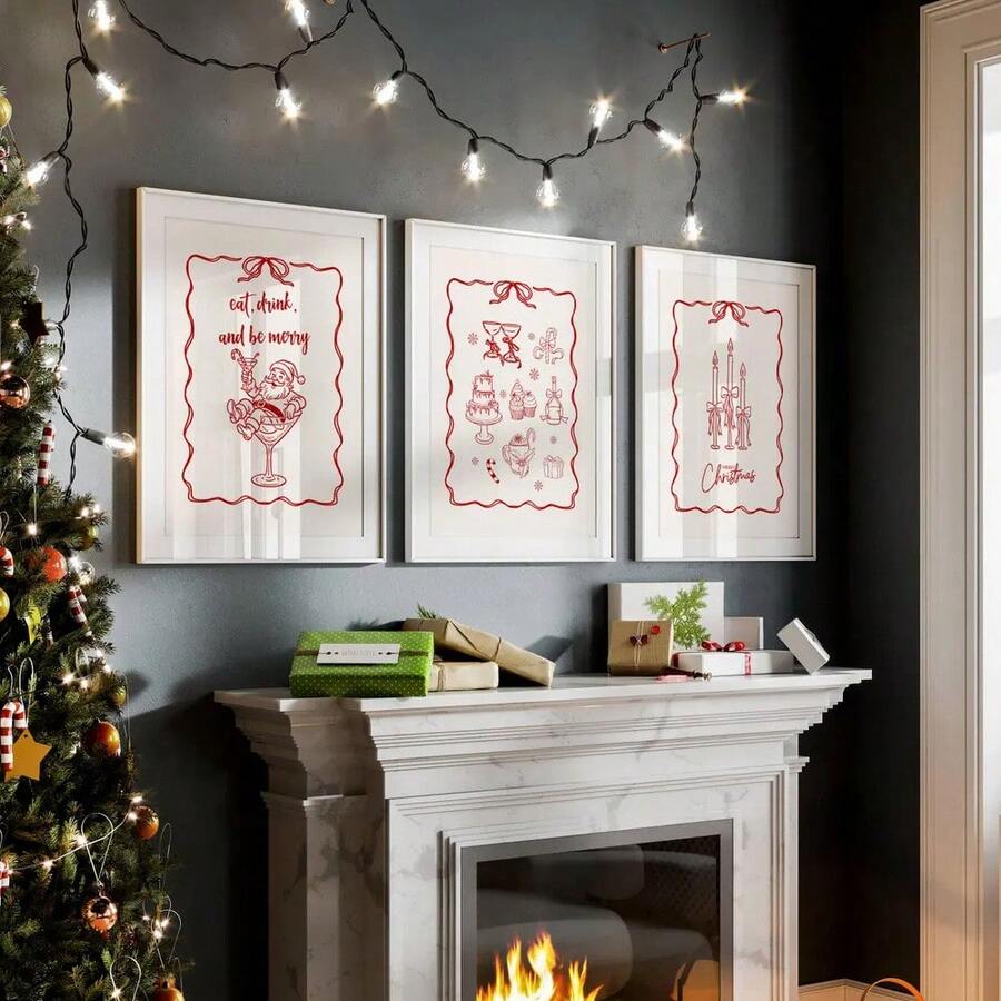 Three red Christmas canvas prints displayed near a fireplace and tree