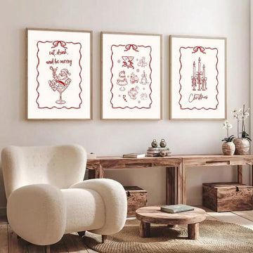 Three red Nordic Christmas canvas prints displayed in a living room