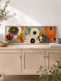 Mid-century floral poster styled on a light wood sideboard