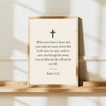 Psalm scripture cross poster in a gold frame on a wood shelf