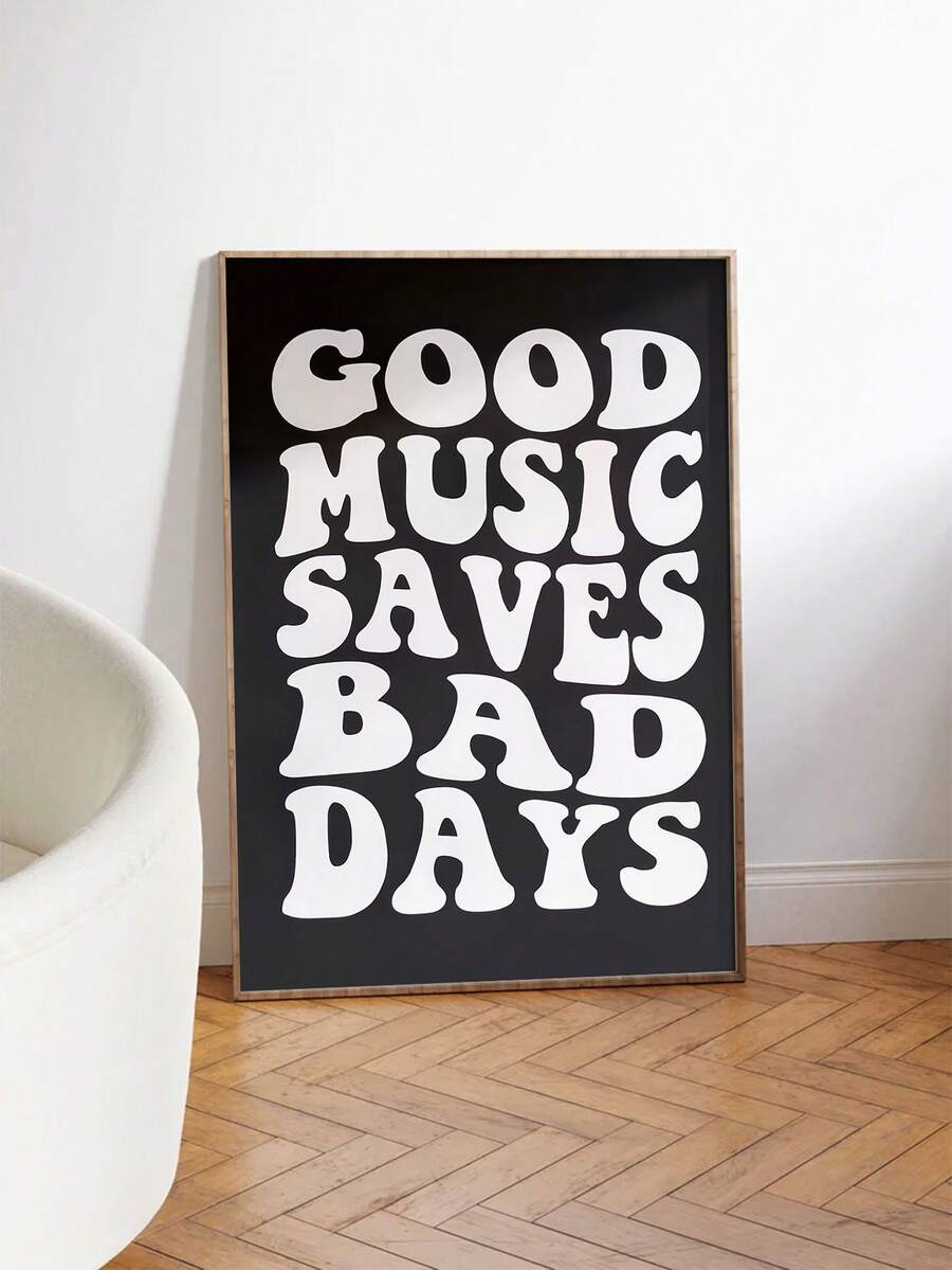 Music quote canvas poster displayed above a cream chair in a warm living room