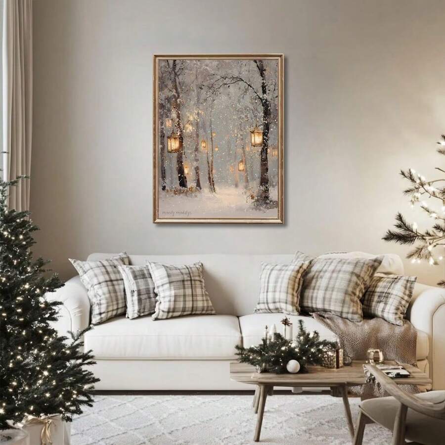 Framed snowy forest lantern print above a white sofa with plaid holiday pillows