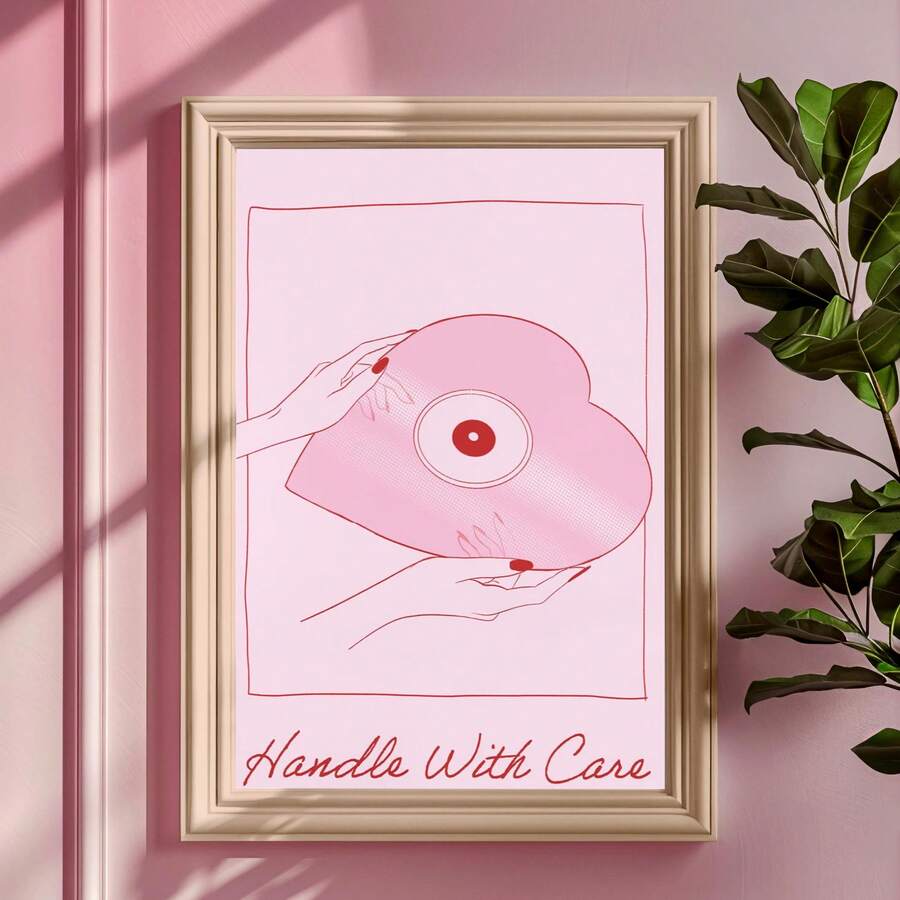 Retro pink vinyl record wall art with Handle With Care message