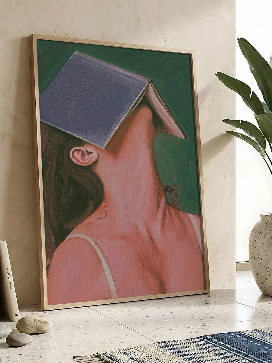 Black cat with strawberry cake framed wall art in a warm room