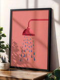 Close view of framed pink shower artwork with blue falling drops