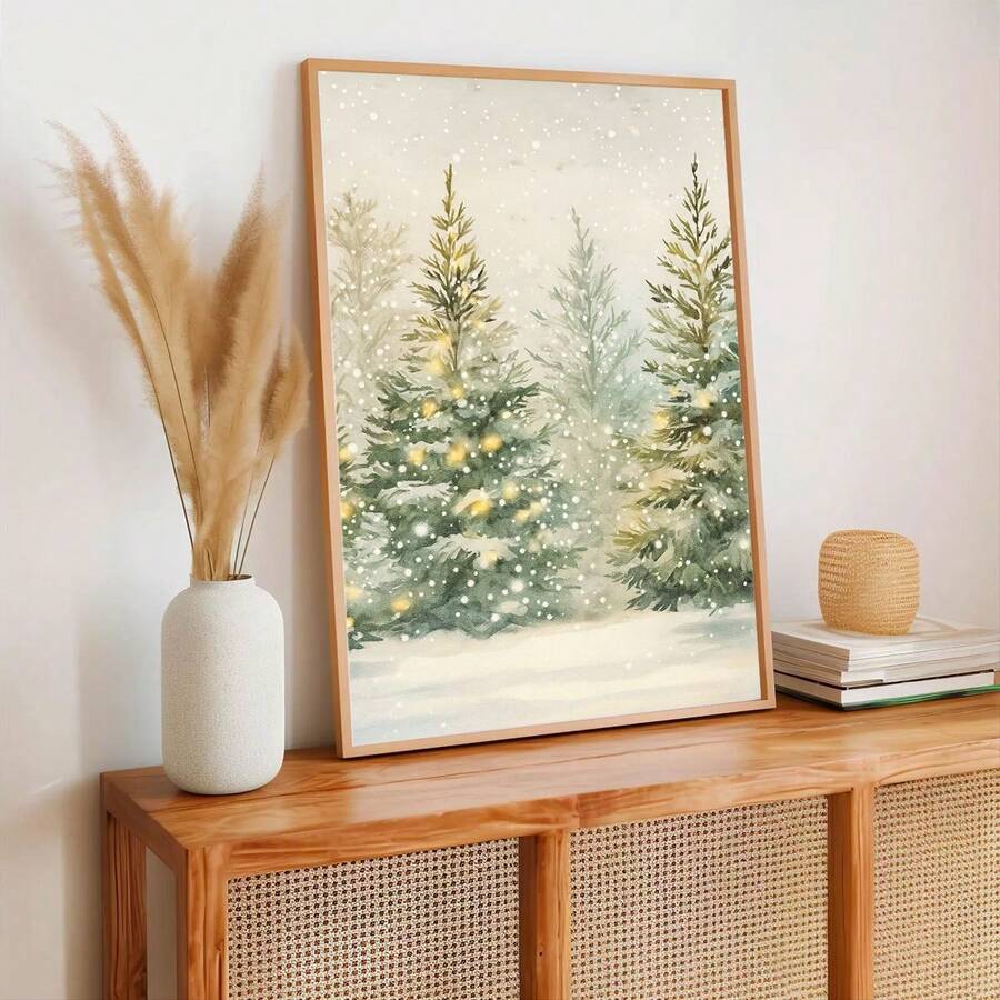 Snowy evergreen holiday print displayed in a warm wood frame
