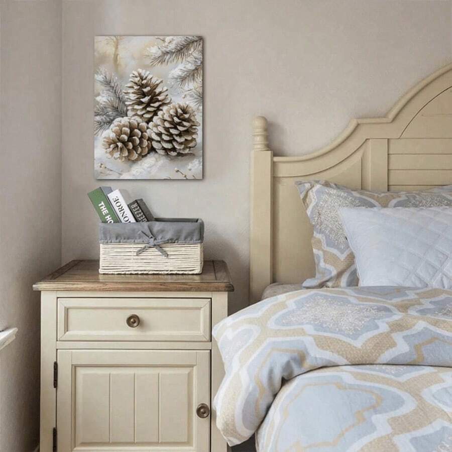 Winter pinecone wall art displayed above a bedroom bedside table