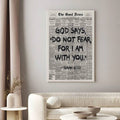 Unframed Isaiah 41:10 poster displayed above a cream sofa in a bright living room