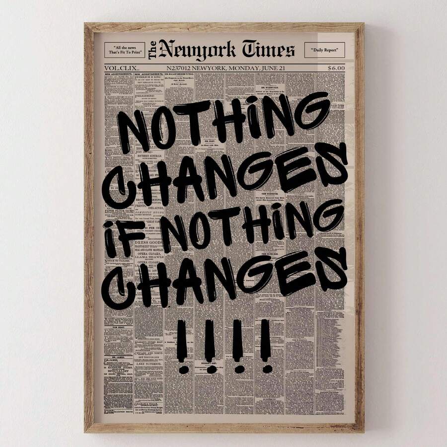 Framed Bible verse poster with oversized black lettering on cream newspaper print