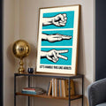 Framed turquoise hand gesture poster on a living room console