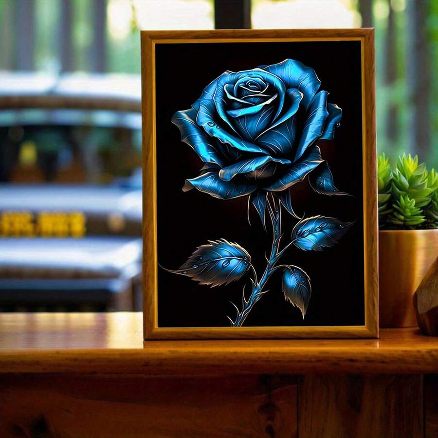 Blue rose floral poster in a wood frame on a tabletop display