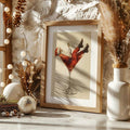Framed Santa cocktail wall art displayed with festive ornaments and lights