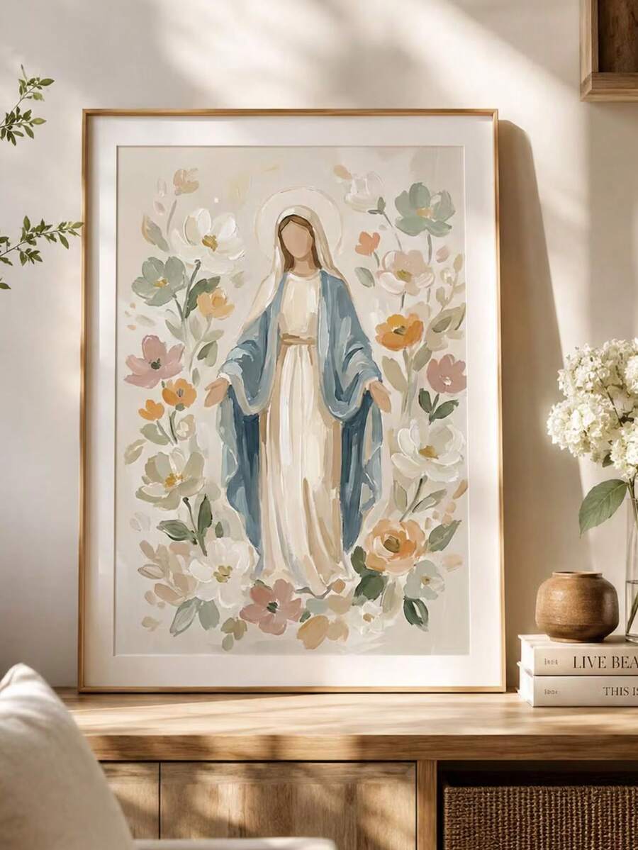 Soft floral portrait of Mary in a blue mantle surrounded by pastel blossoms in a light wood frame
