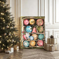 Colorful bauble canvas displayed beside a decorated tree and presents