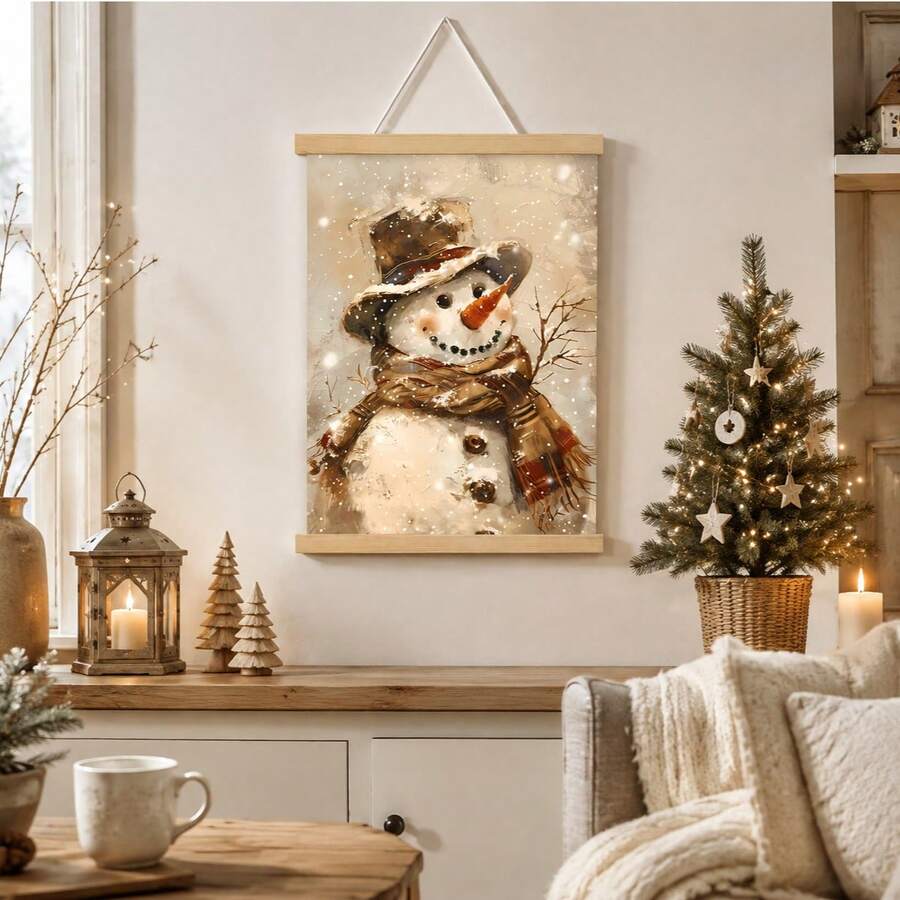 Snowman winter print on a wooden hanging scroll above a console beside a small Christmas tree and lantern