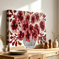Vintage-inspired flower vase artwork above a warm wood console