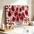 Floral vase canvas styled beside a bathroom vanity and folded towels