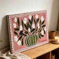 Floral vase canvas print styled on a living room sideboard with neutral decor