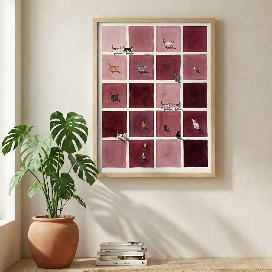 Mid-century cat grid wall art in a light wood frame beside a houseplant