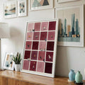 Cat grid canvas poster styled with modern framed wall art on a console
