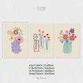 Close view of three playful floral vase illustrations with colorful sketch-style blooms